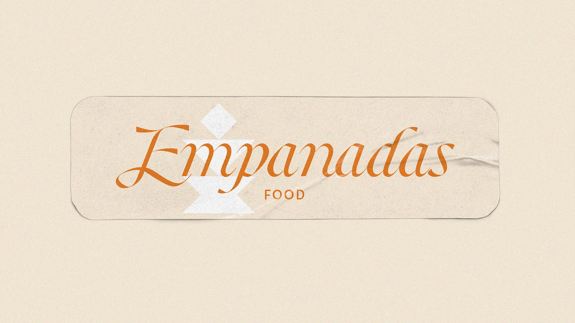 Le mot « Empanadas » en écriture cursive orangée, avec la mention « Food », sur fond crème.